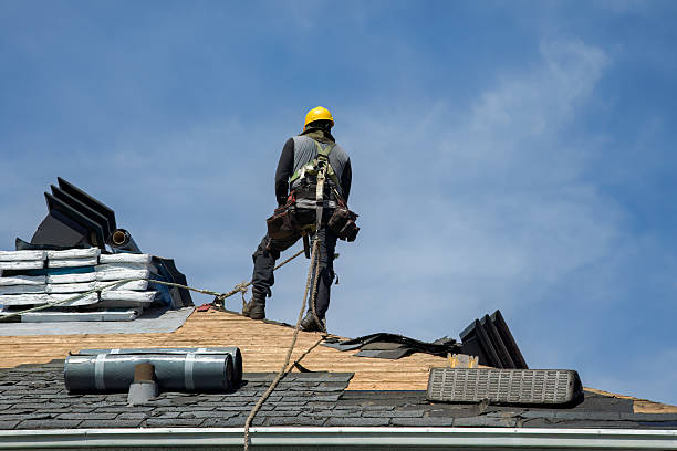 Professional Roof Replacement technician working in Smithtown, NY